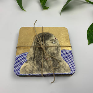 An angled shot of the stacked hand-painted coasters bundle. The portrait of the royal lady is visible on the top layer, secured by a rustic jute twine bow, highlighting the thickness and quality of the plywood set.
