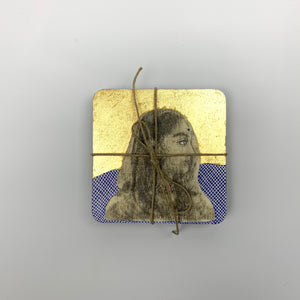 A stacked set of four hand-painted coasters, tied with jute twine, featuring the portrait of a royal lady on top.