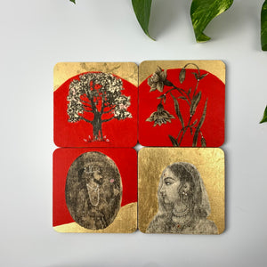 A set of four hand-painted coasters featuring Mughal miniature art, including a Raja, a Rani, and floral motifs on red and gold backgrounds.